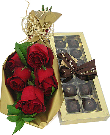 As inigualáveis rosas importadas vermelhas compõem este suntuoso bouquet. Acompanha uma linda caixa de bombons sortidos embaladas para presente da tradicional doceria paulistana Amor aos Pedaços.