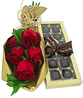 As inigualáveis rosas importadas vermelhas compõem este suntuoso bouquet. Acompanha uma linda caixa de bombons sortidos embaladas para presente da tradicional doceria paulistana Amor aos Pedaços.