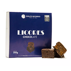 Caixa com 9 deliciosos pães de mel embebidos com licor de chocolate.